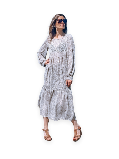 Lace dress, sand